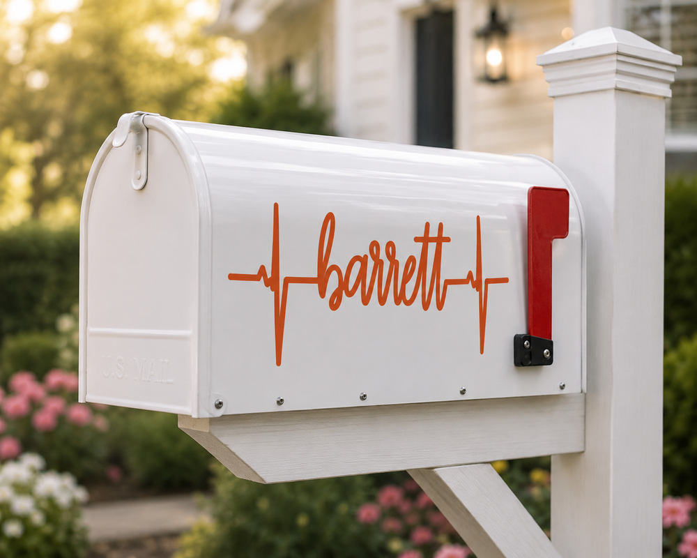 Example of orange Barrett heartbeat lettering on a white mailbox