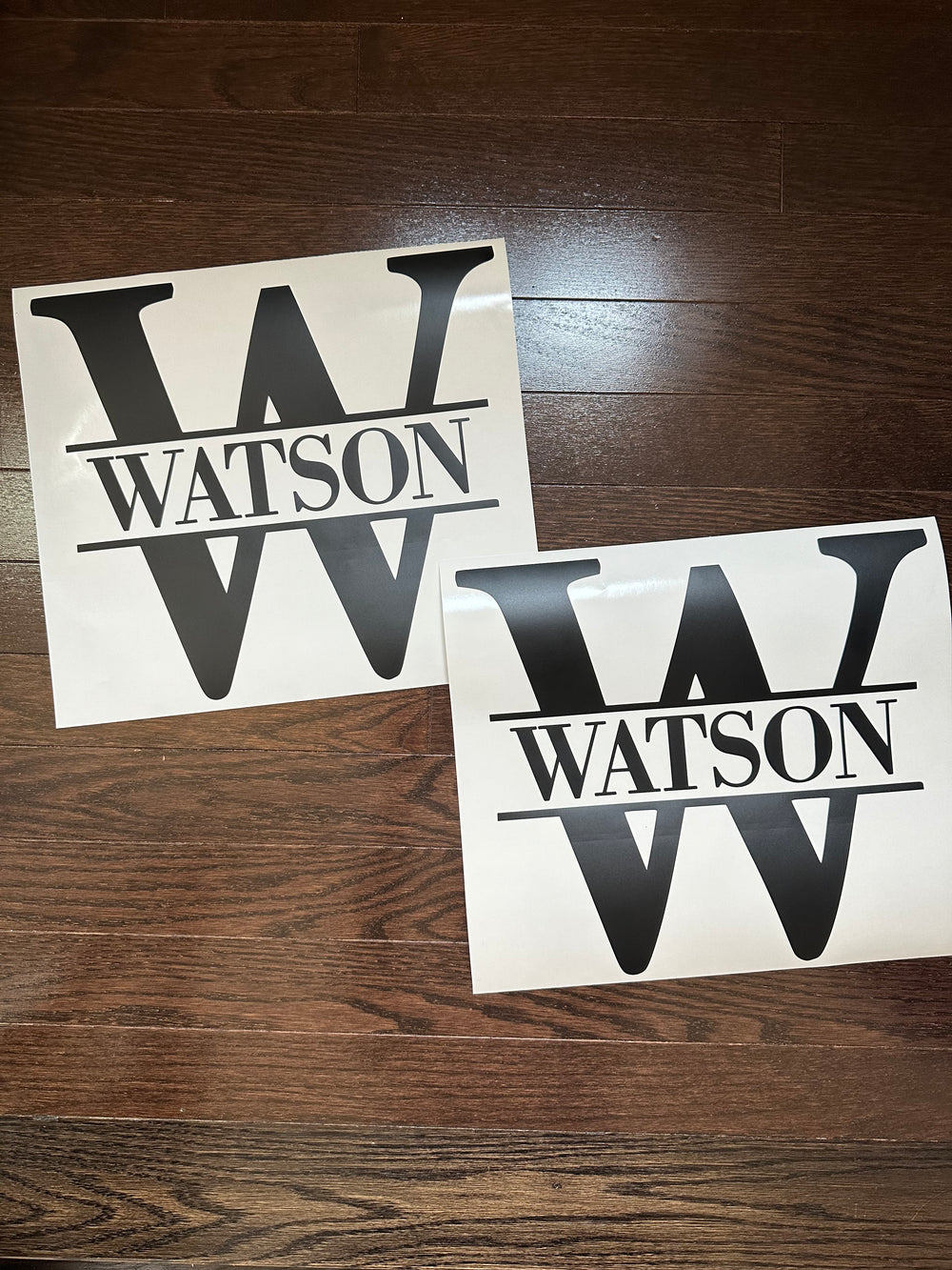 Two black Watson split-monogram decals