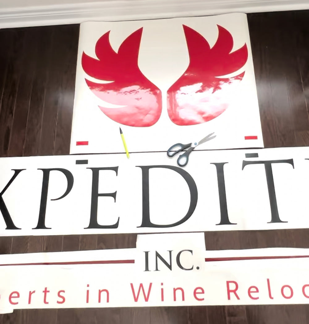 Red and black XPEDITR business logo decals