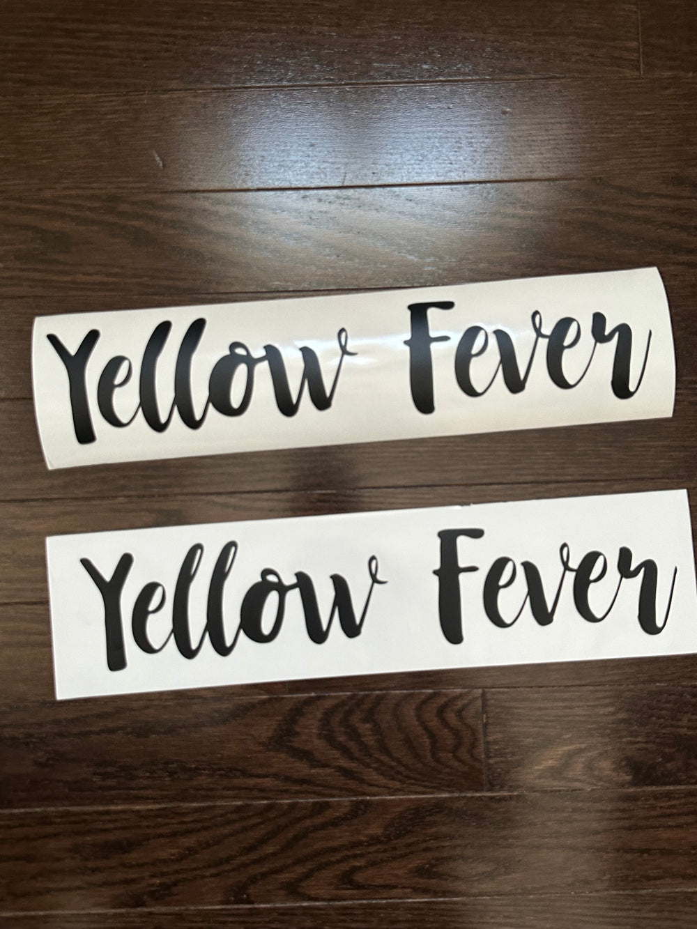 Two black Yellow Fever boat name decals