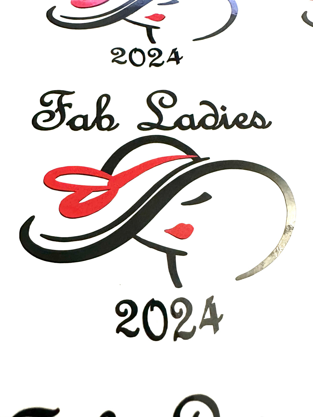 Close-up of Fab Ladies 2024 layered logo decals