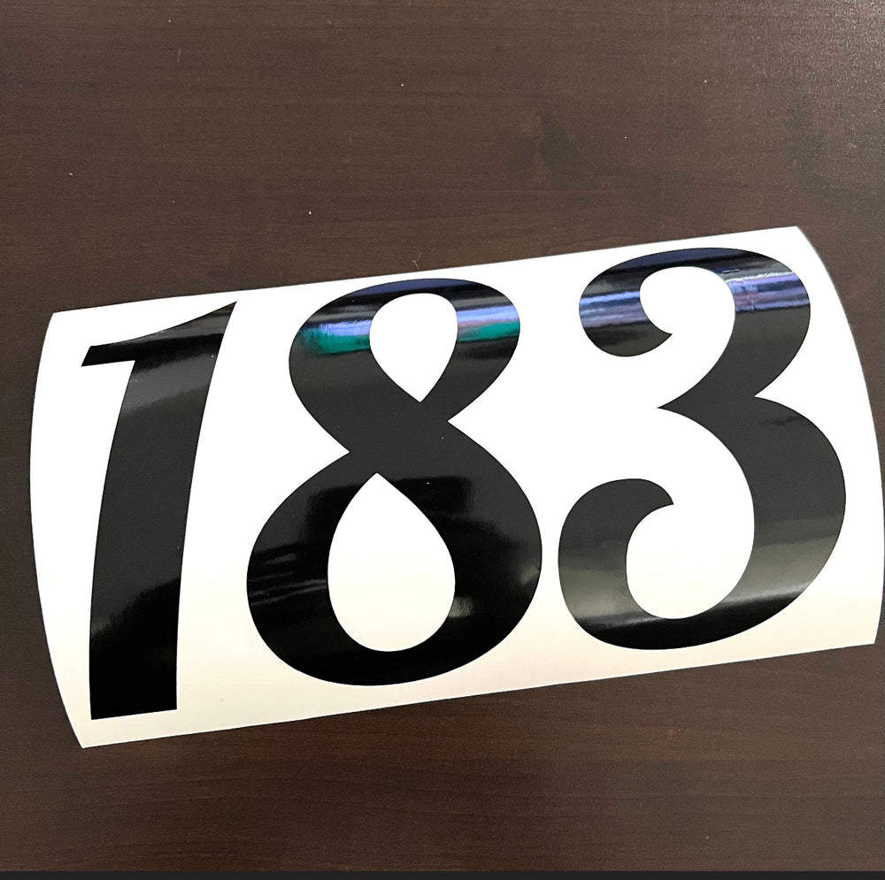 Black 783 number decal on curved backing