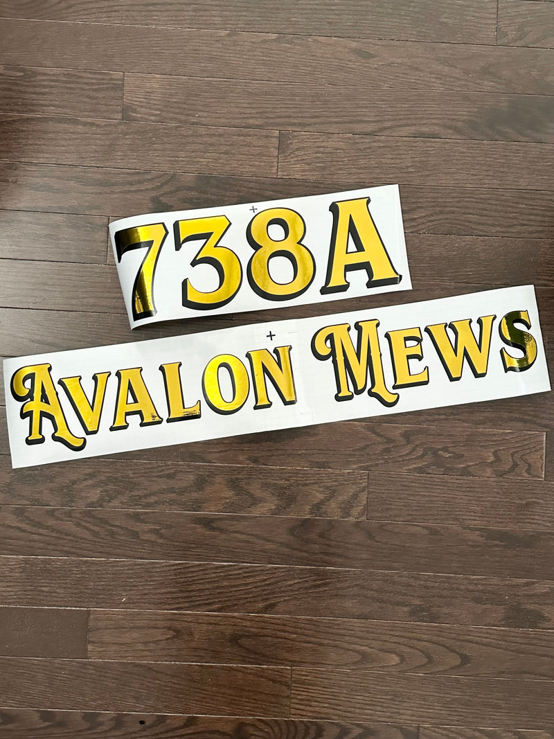 Gold and black 738A and Avalon Mews decals laid out separately