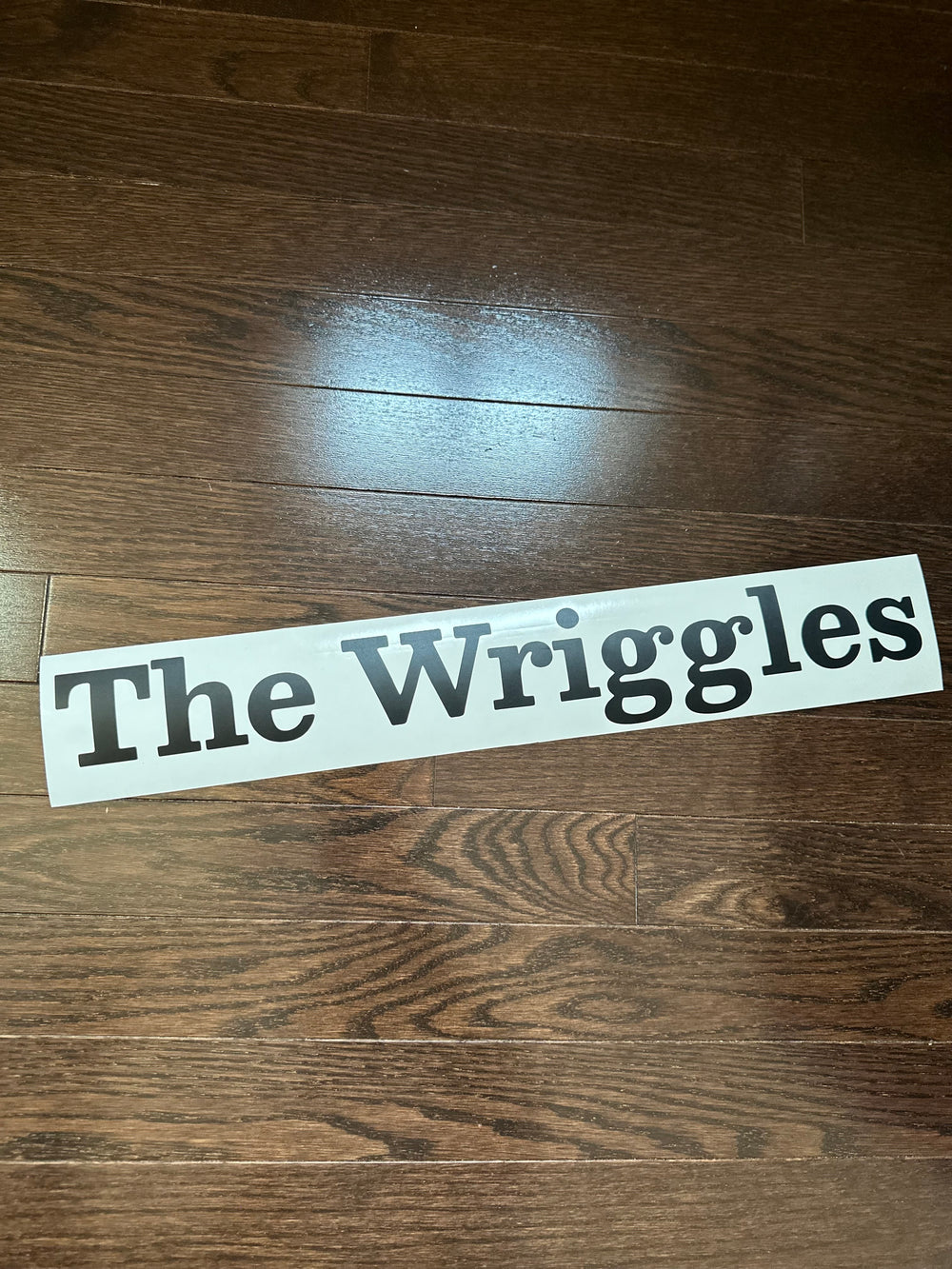 Black The Wriggles lettering