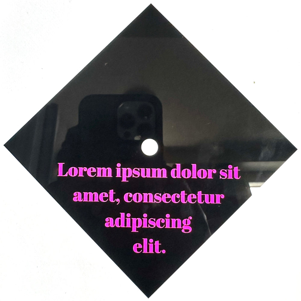 Pink placeholder lettering on a black graduation cap example