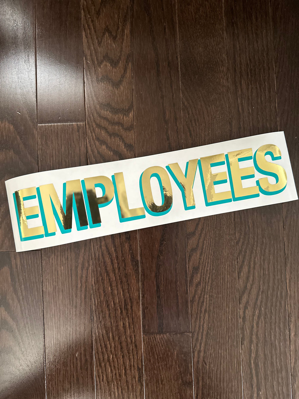 Gold and teal Employees layered lettering decal