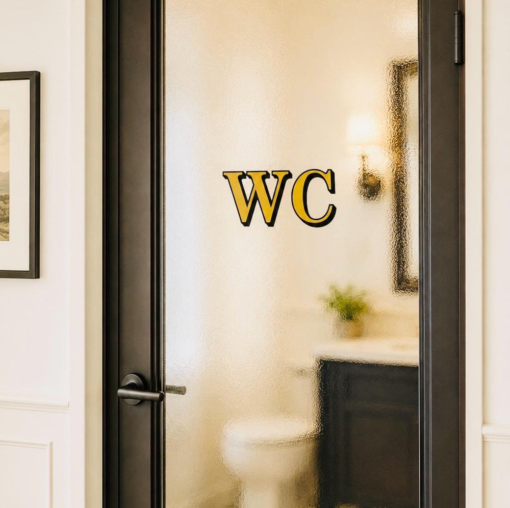 Example of gold and black WC lettering on bathroom glass