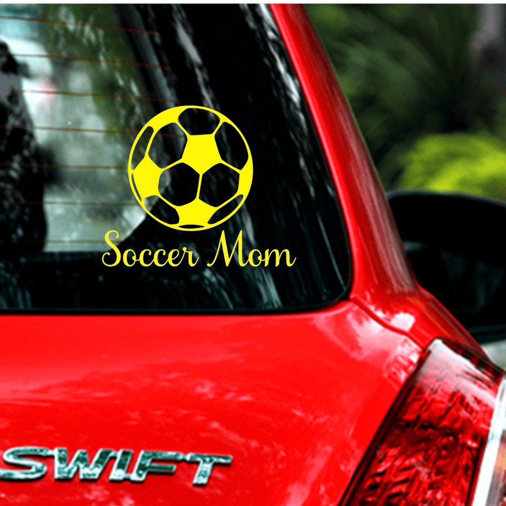 Yellow Soccer Mom design on a red car window