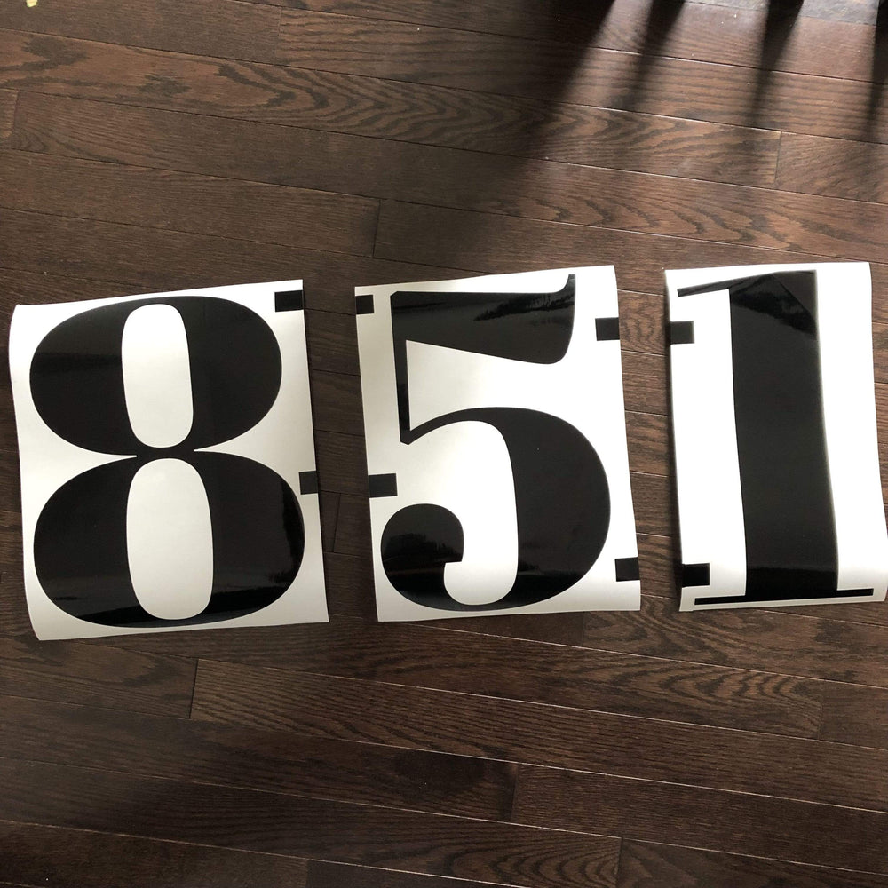 Black 851 digits on backing sheets