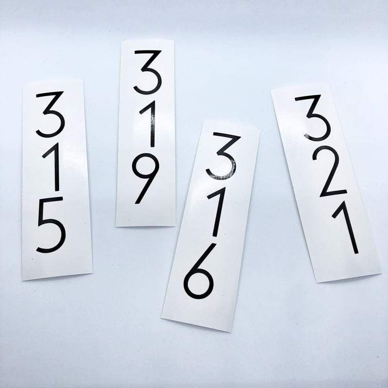 Black 315, 319, 316 and 321 digits stacked on separate backing strips