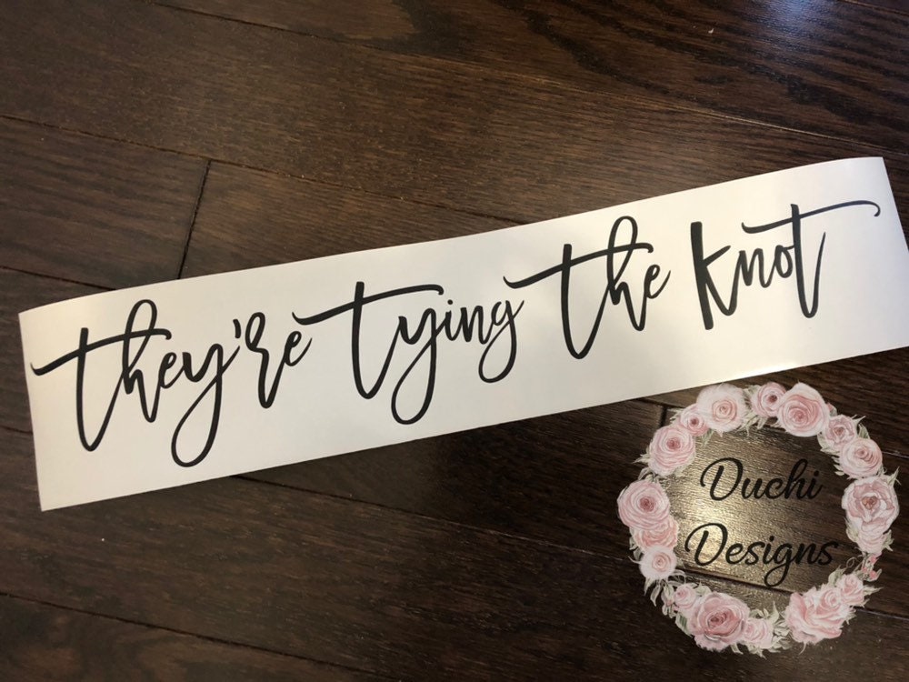 Black They’re tying the knot script lettering