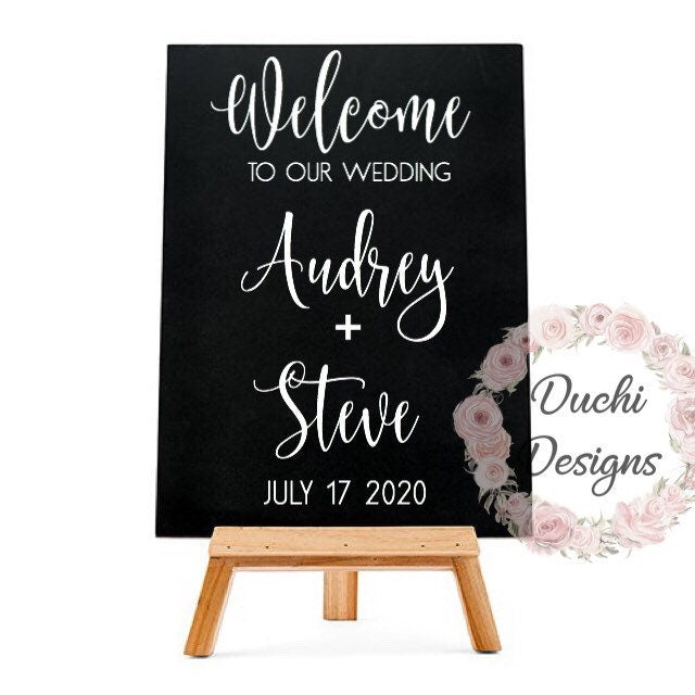 Illustration of Audrey and Steve wedding welcome lettering on a black easel sign