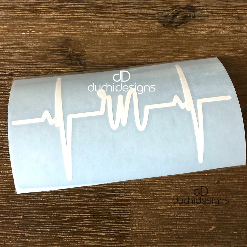 White M initial with heartbeat line decal