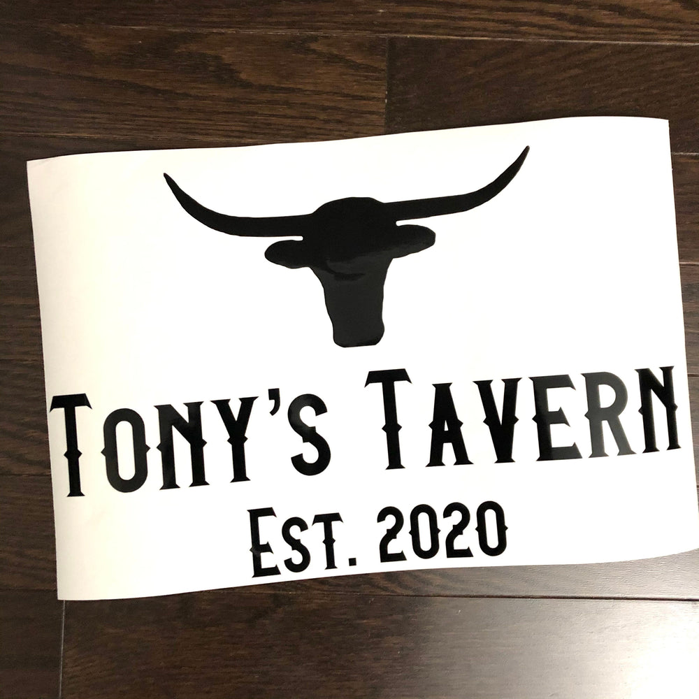 Black Tony’s Tavern lettering with a longhorn design