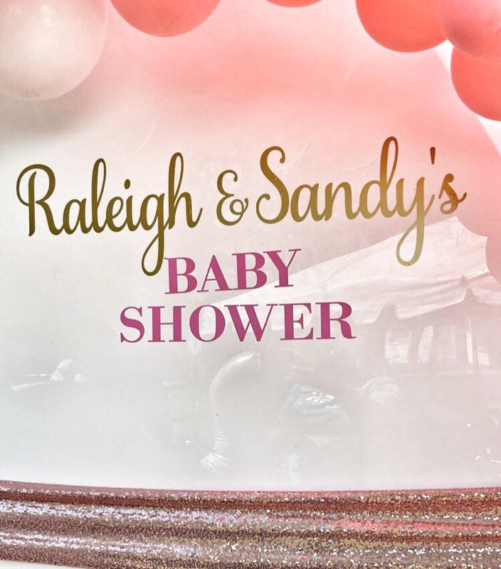 Raleigh & Sandy’s Baby Shower lettering on a balloon backdrop