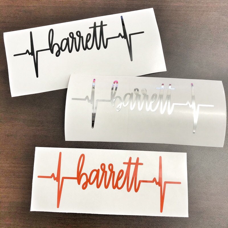 Black white and orange Barrett heartbeat name decals on backing paper