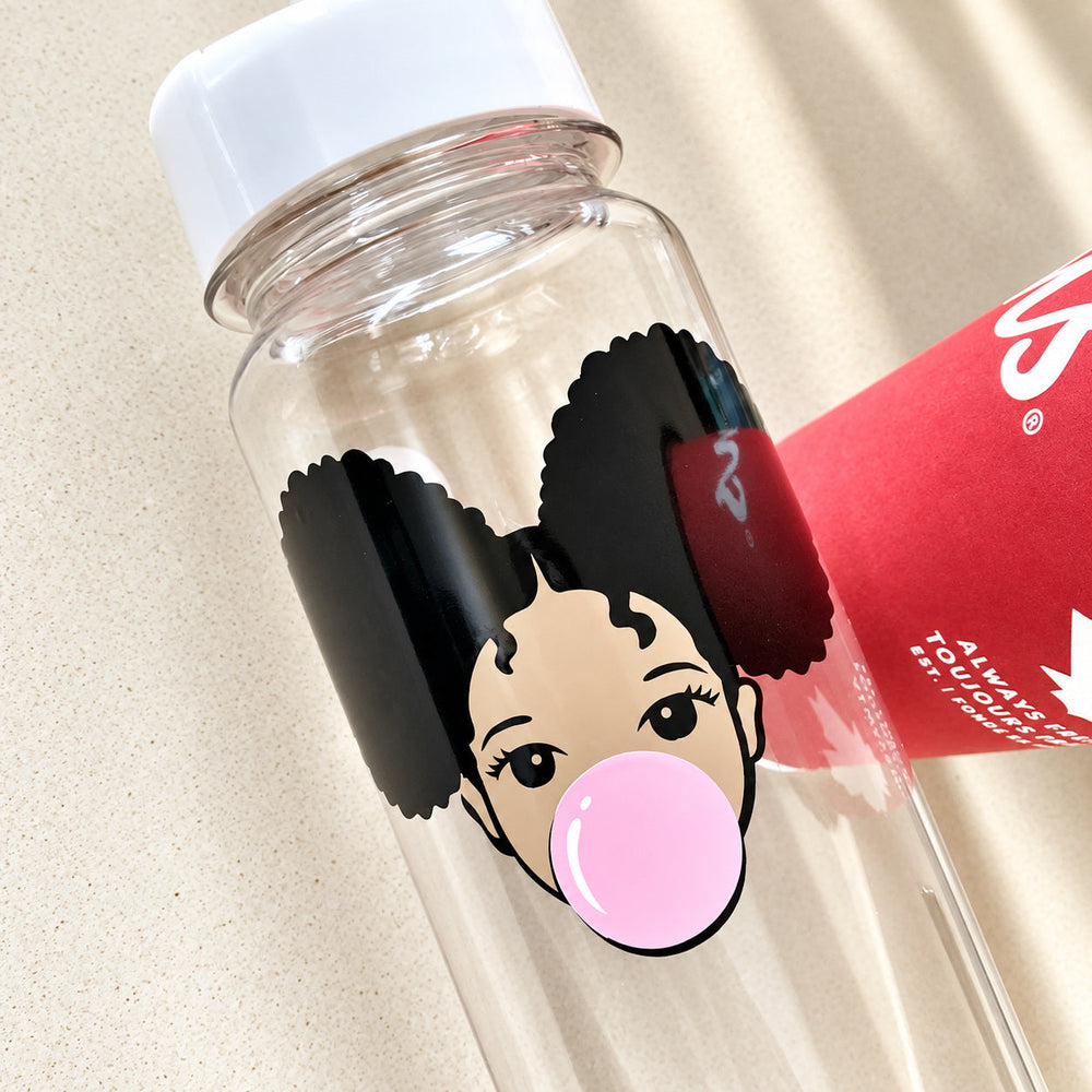 Multicolour face design on a clear bottle