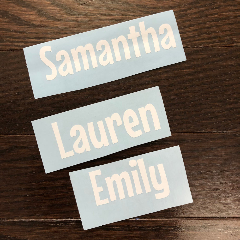 White Samantha, Lauren and Emily name decals on blue backing