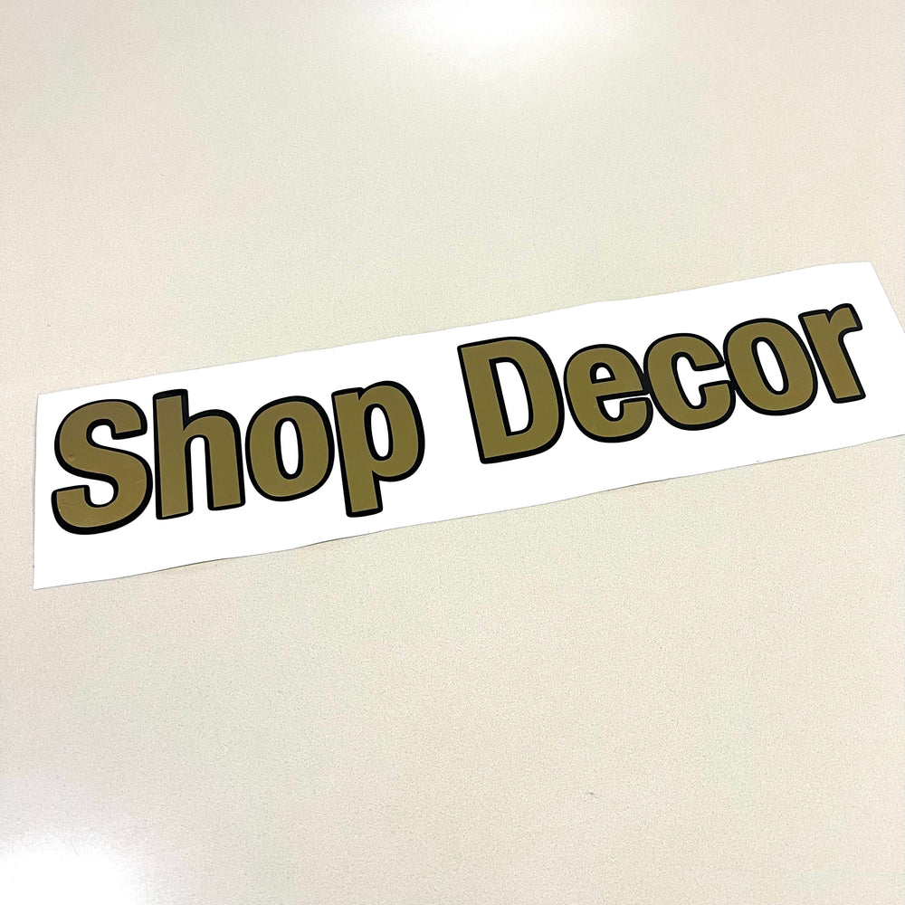 Gold and black Shop Decor lettering