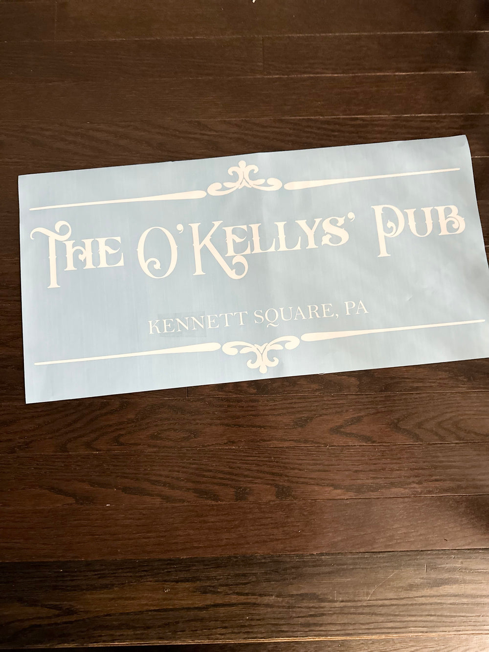 White The O’Kellys’ Pub decorative decal on backing