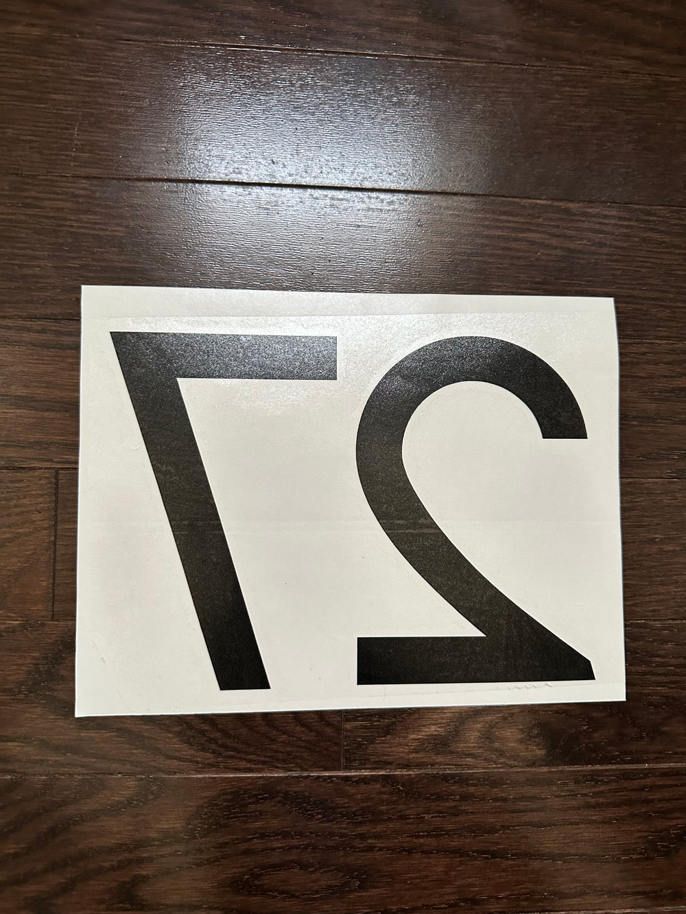 Reverse-oriented black 27 number decal