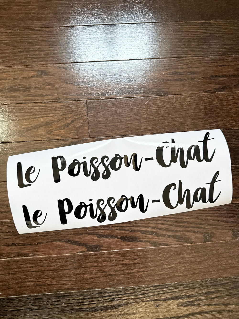 Two black le Poisson-Chat boat name decals