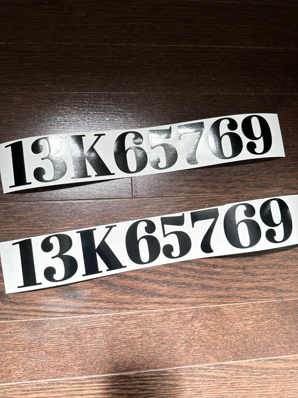 Two black 13K65769 registration number decals