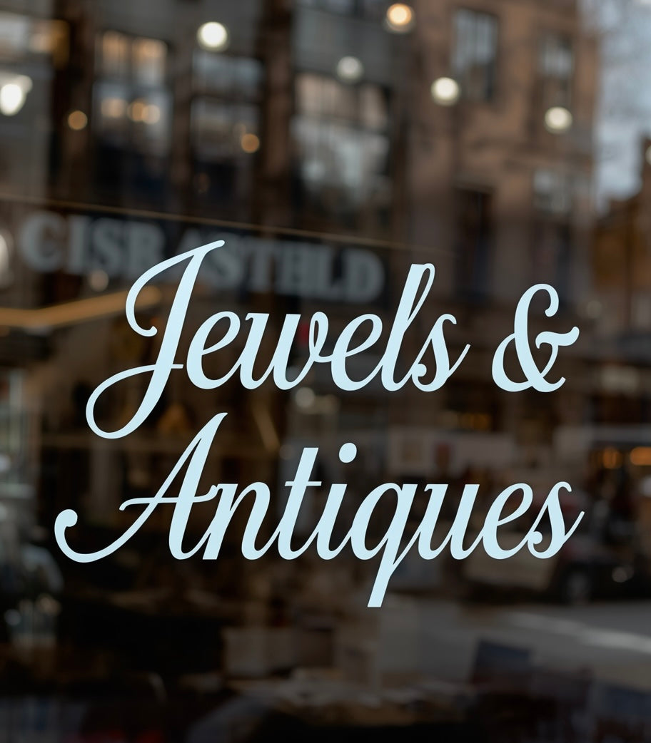 Example of Jewels Antiques two-line window lettering