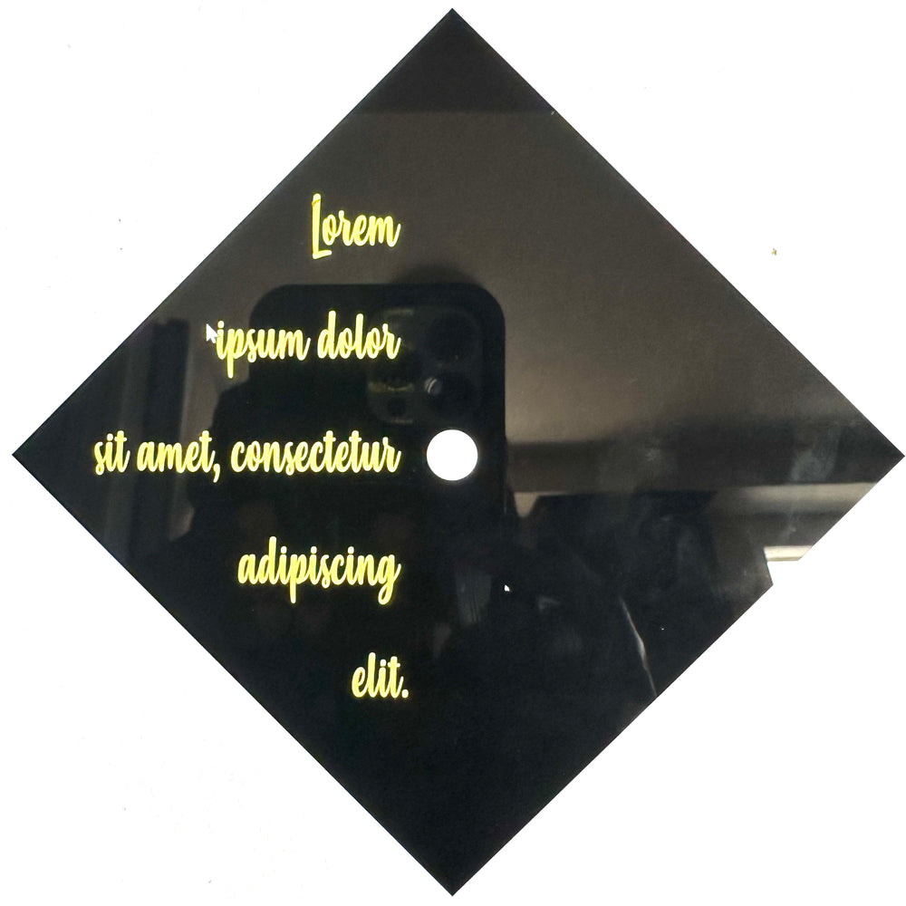 Yellow placeholder lettering on a black graduation cap example