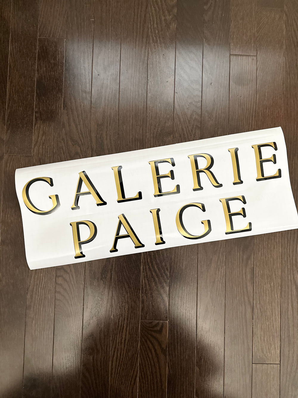 Gold and black Galerie Paige lettering