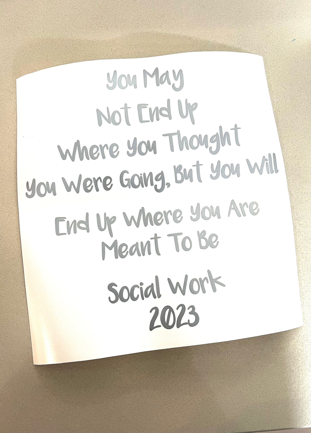 White Social Work 2023 quote lettering on backing
