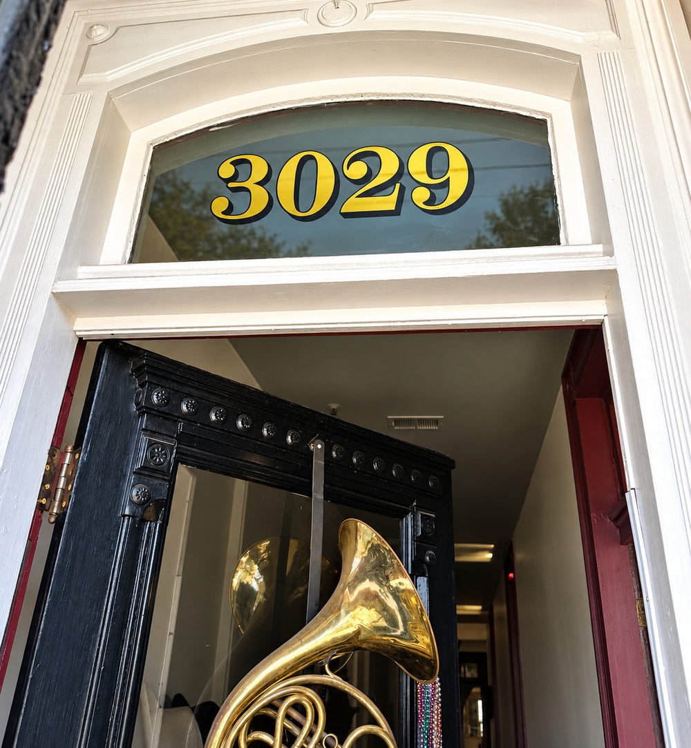 Heritage gold and black transom house numbers