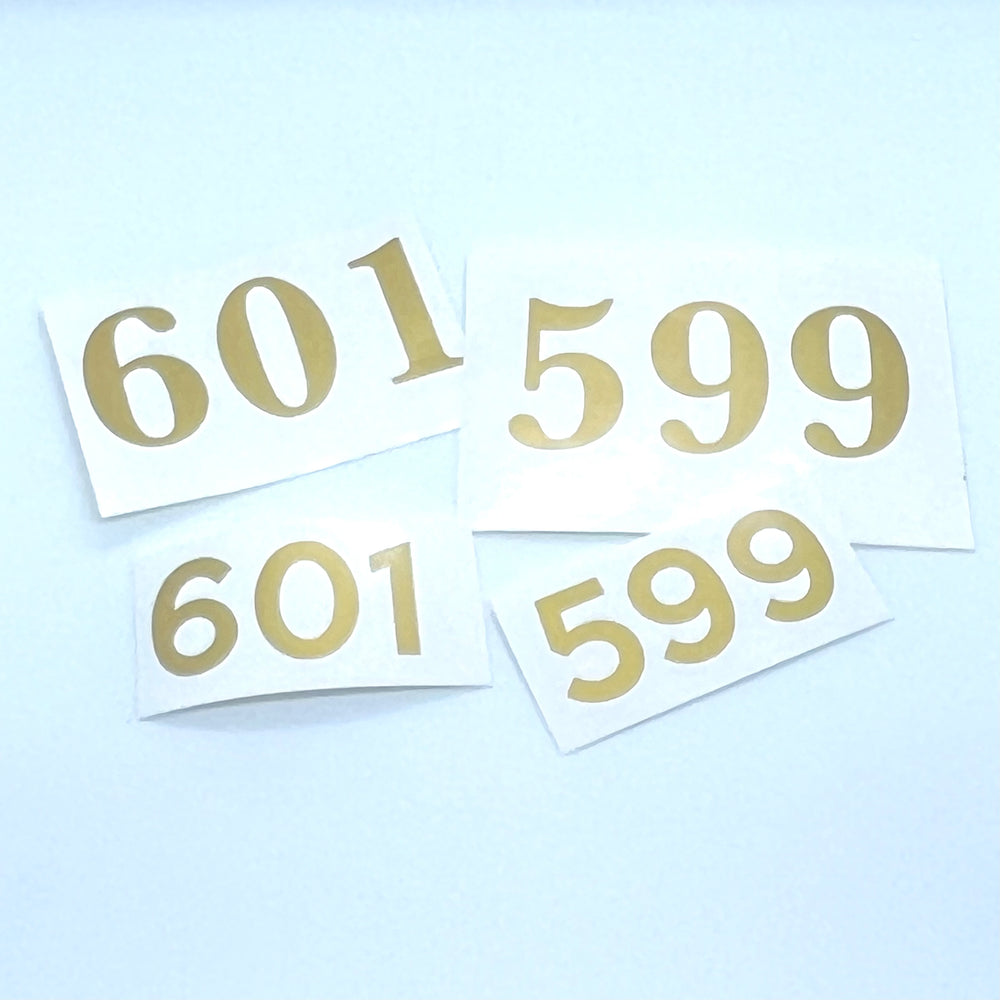 Gold-coloured 601 and 599 number decals