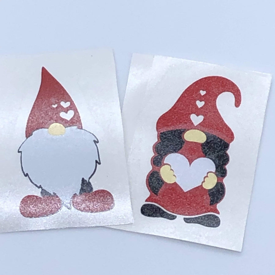 Two gnome-shaped decorative decal examples on backing