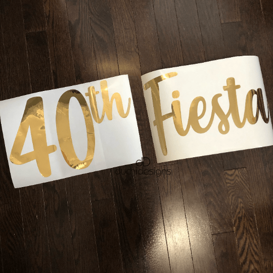 Reflective gold 40th Fiesta lettering on backing