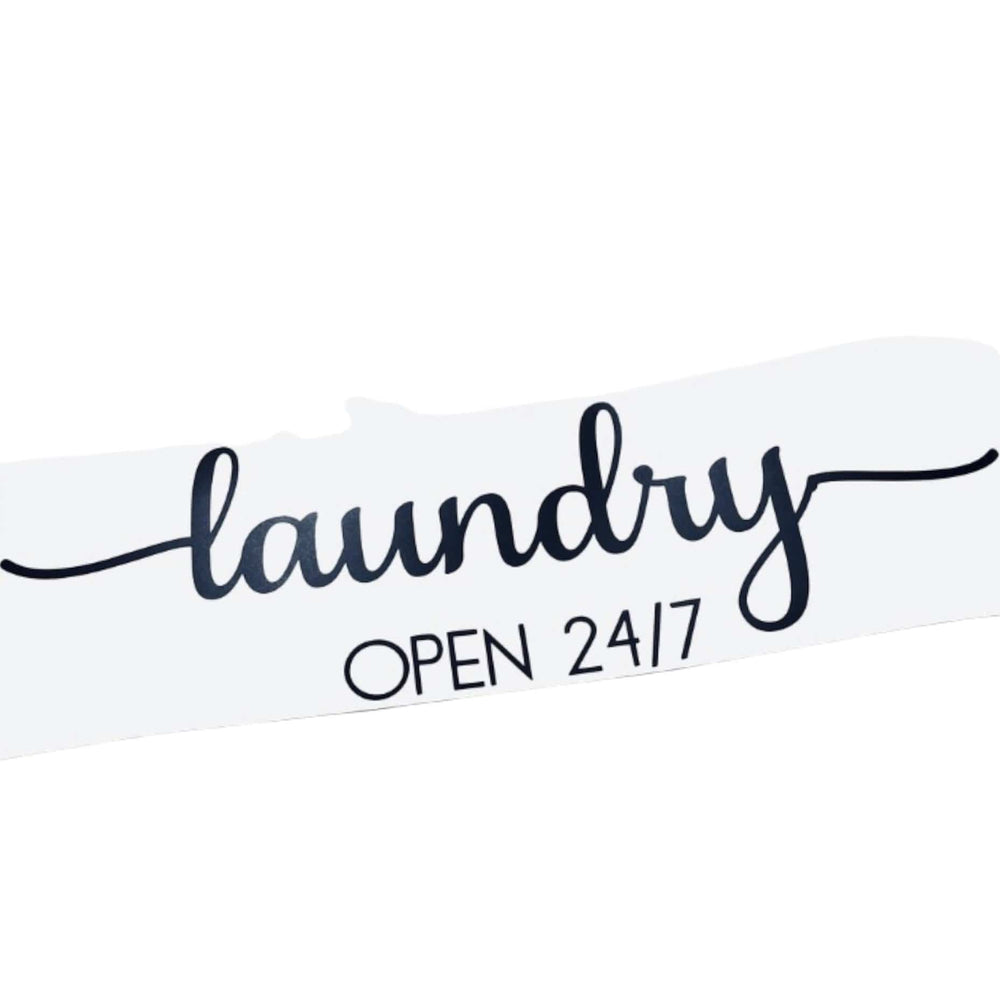 Black laundry Open 24/7 lettering on white backing