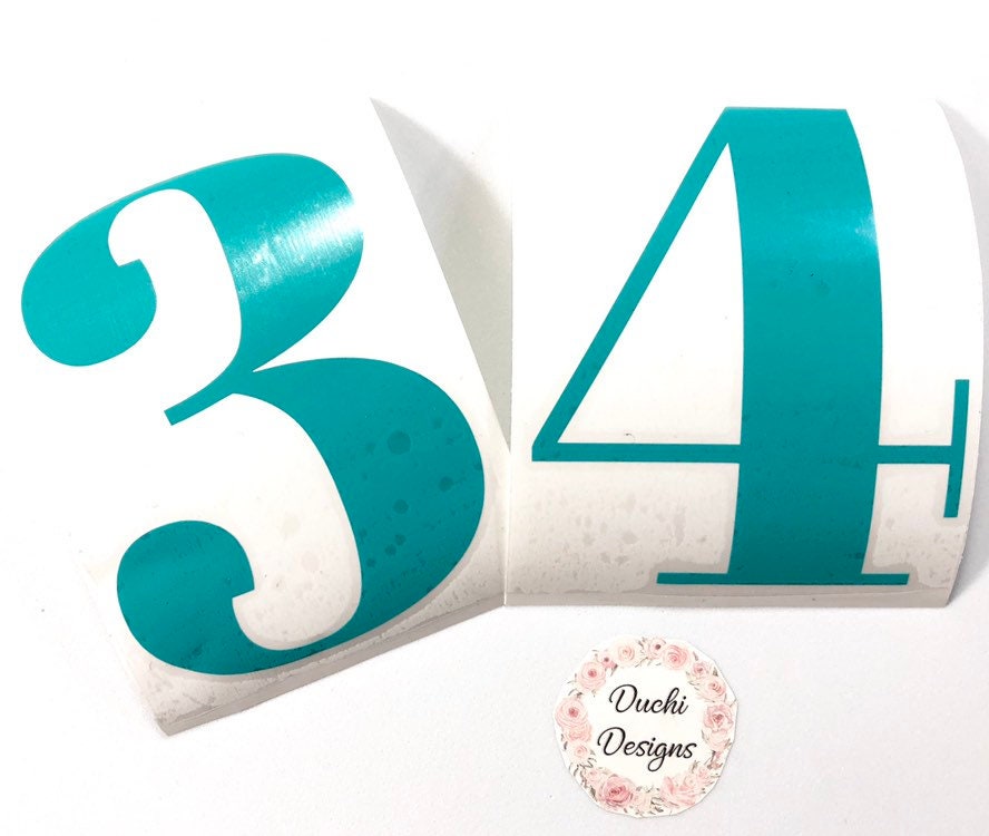 Teal 34 number decals on curved backing