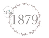 Grey 1879 numbers in a circular wreath design