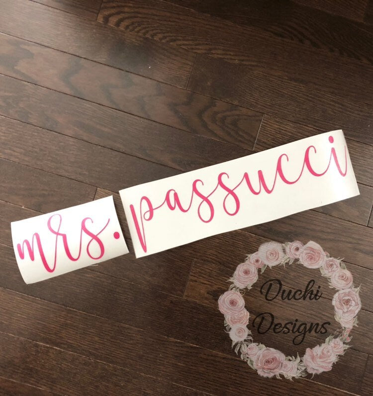 Pink Mrs. Passucci lettering laid on backing
