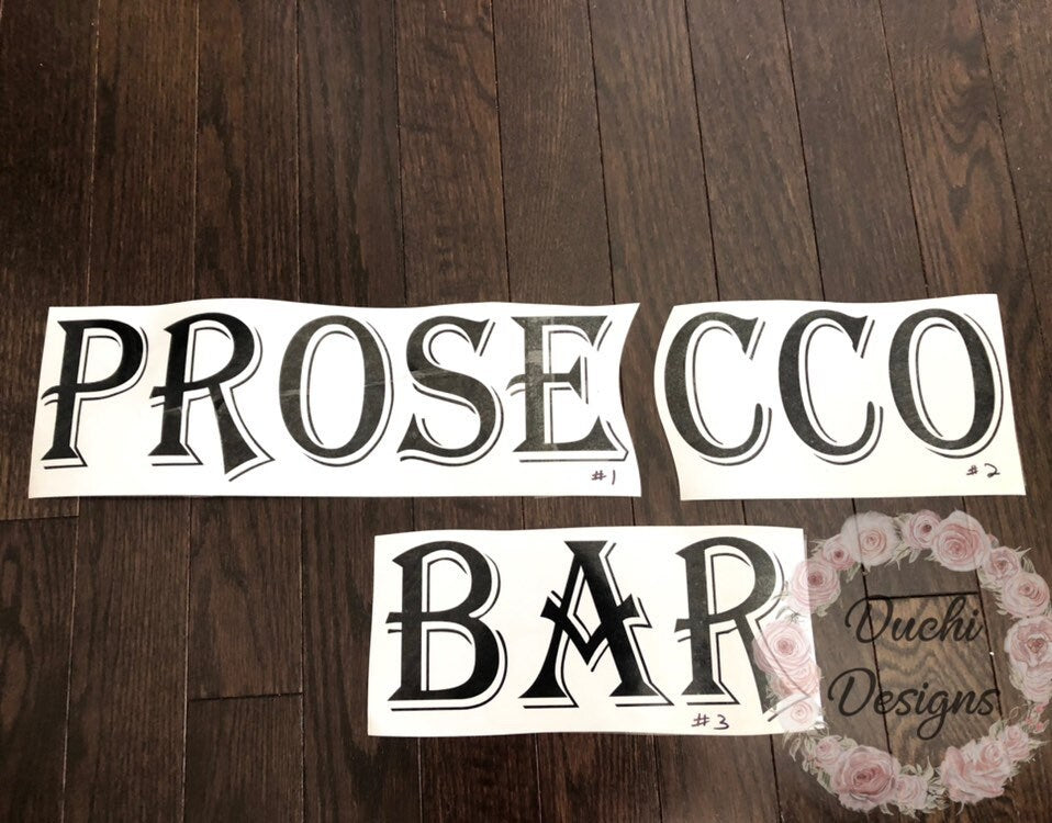 Outlined Prosecco Bar lettering on backing