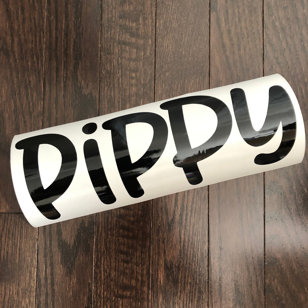 Black Pippy name decal on curled backing
