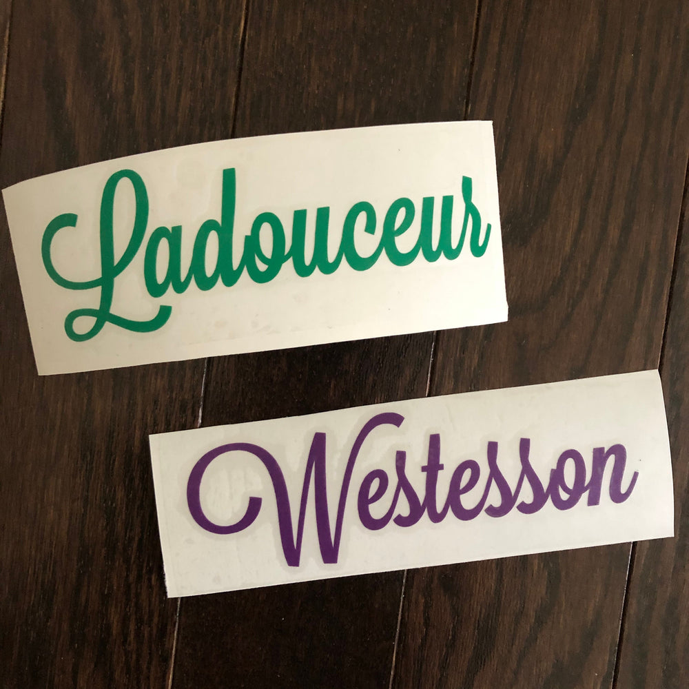 Green Ladouceur and purple Westesson script name decals