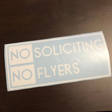 White No Soliciting No Flyers lettering on pale backing