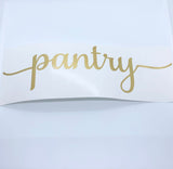 Gold-coloured pantry script decal on curved backing