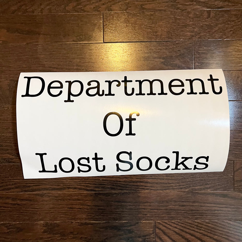 Black Department of Lost Socks lettering