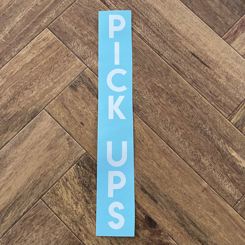 White RICK UPS vertical lettering on blue backing